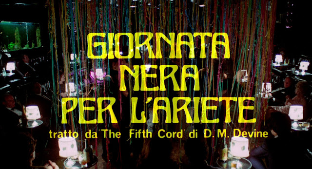 Credits in Italian reading "Giornata nera per l'ariete. Tratto da "The Fifth Cord" di D.M. Devine." In an art nouveau font in yellow against a dark background shot of the nightclub party seen in the previous shot.