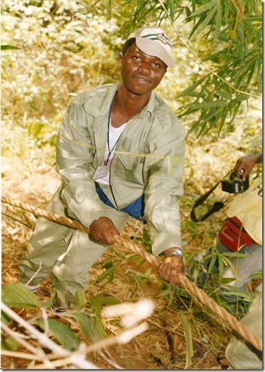 Jide Ogunsanya in his NYSC kit, climbing down the hill during the endurance trek
