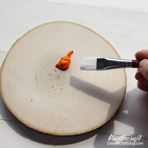 Wood Slice Pumpkin Step 1: Paint Begin by painting the top of the wood slice with orange craft paint. Then let the paint dry completely.