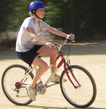 Boy driving a bicycle