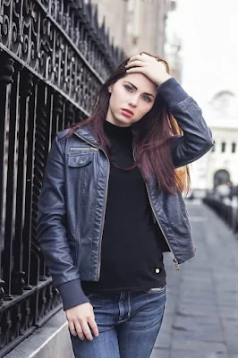 A Beautiful Girl Wearing Black Leather Jacket
