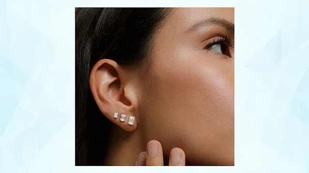 A set of lab-made diamond stud earrings