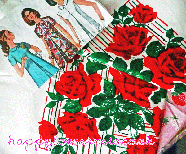 vintage sewing patterns and red rose tablecloths