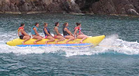 Charter Yacht PROMENADE has lots of fun toys. Ride the Banana! Contact ParadiseConnections.com