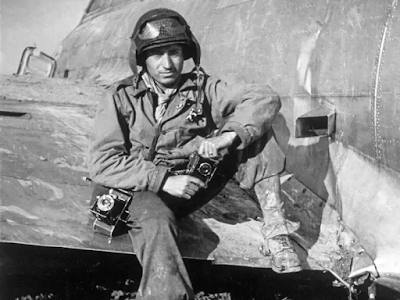 Then-GI Tony Vaccaro on the wing of a B-17 Bomber in 1944.