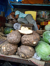 vegetable vendor selling pumpkins