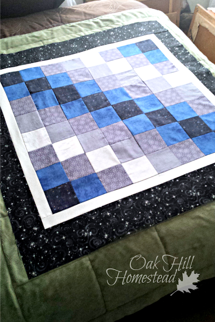 The patchwork top for the Starry Night crib quilt.