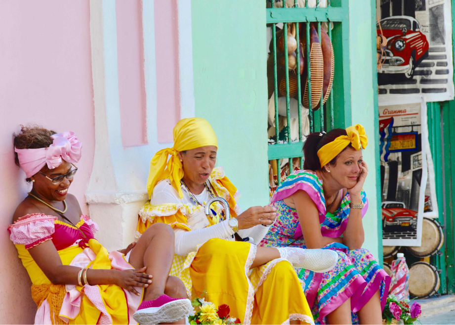 Ladies in costume instreet Havana Cuba
