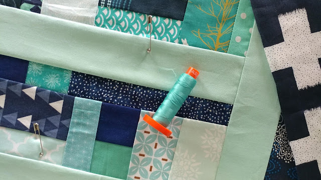 Detour quilt in aqua and navy from Stash Statement quilting book by Kelly Young