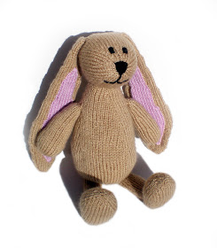 a fancy beige knitted plush bunny or rabbit called humboldt