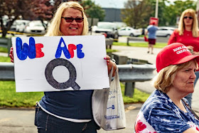 Followers of the QAnon movement regularly show their support for Donald Trump at his political rallies, including this one held in Pennsylvania in 2018.