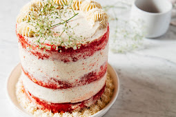 a naked red velvet cake with crème fraîche frosting for a blog birthday