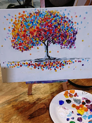 Colourful picture of a tree with paint palette