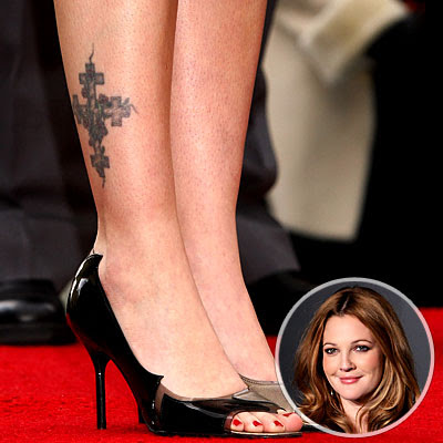 Drew Barrymore also has a cute butterfly tattooed just below her belly 