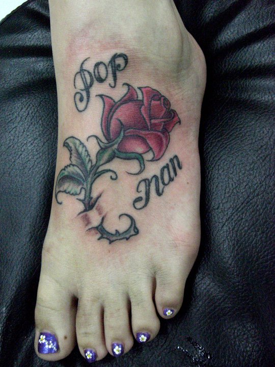 rose tattoos for women on foot. Foot Tattoos for Women