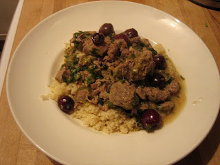 slow-cooked lamb with spring onions, cherries and lemon