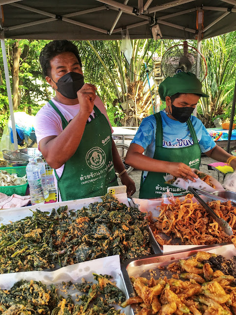 vendors selling fried vegetables at the Ayutthaya Night Market, Thailand