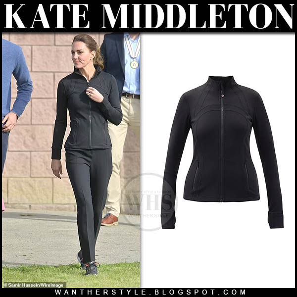 Kate Middleton in black sports jacket, black trousers and sneakers