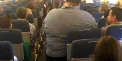 Traveler sues British Airways after he was made to situate close greatly huge man' 