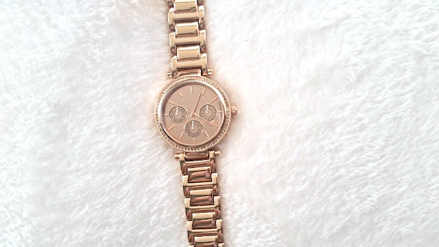 avon rose gold watch