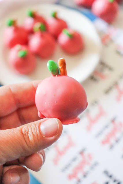 close up of hand holding cookie ball.