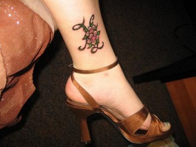 bow tattoo on ankle. panettiere tattoo ankle.