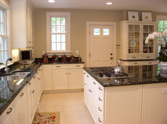 elegant white cabinets with granite and sink design