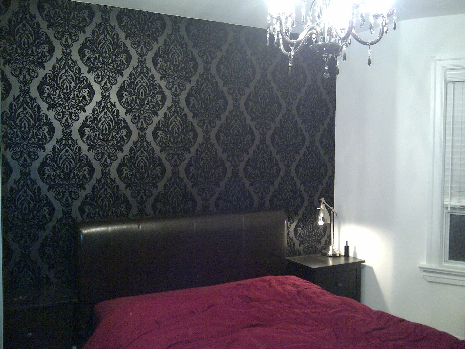 Black velvet damask wallpaper, on headboard wall only.