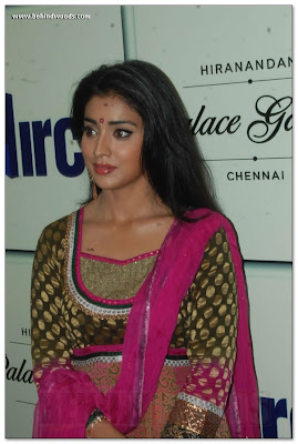 Shriya Saran is in red and green dress