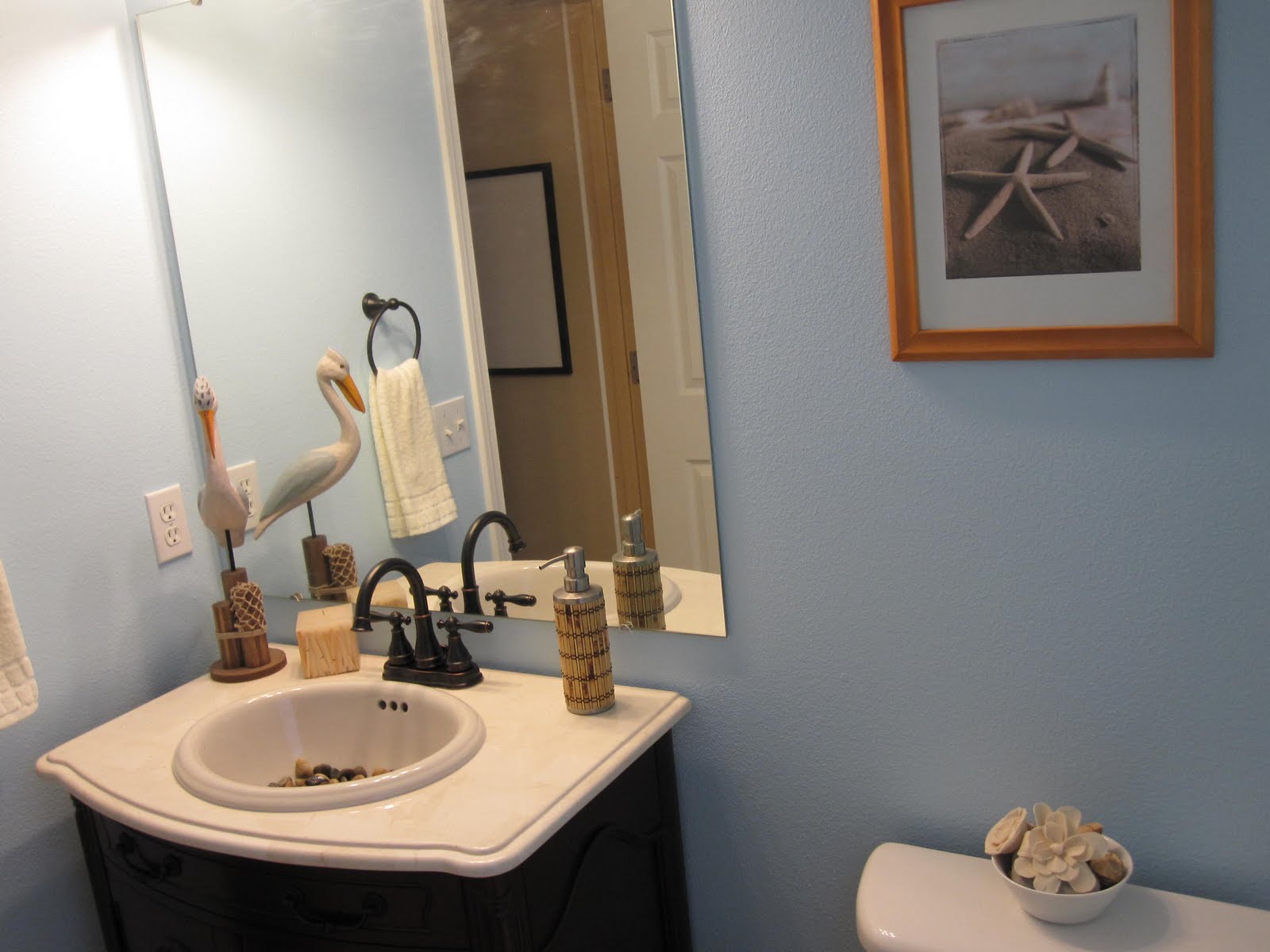 green bathroom vanity Finished vanity with accessories including rocks in the sink :)