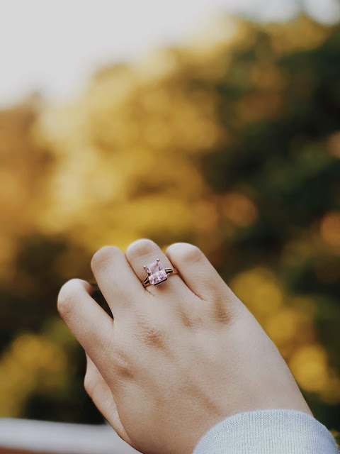 Close-up of a ring on someone's hand.