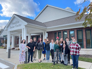 student group outside the Franklin Senior Center