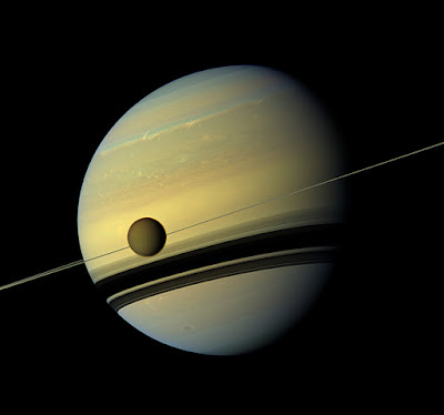 Titan moving away from Saturn faster than expected