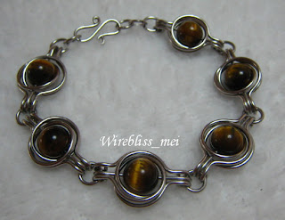 Twice around the world wire wrap bracelet with tiger eye