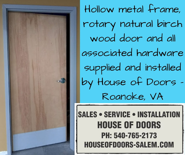 Hollow metal frame, rotary natural birch wood door and all associated hardware supplied and installed by House of Doors - Roanoke, VA