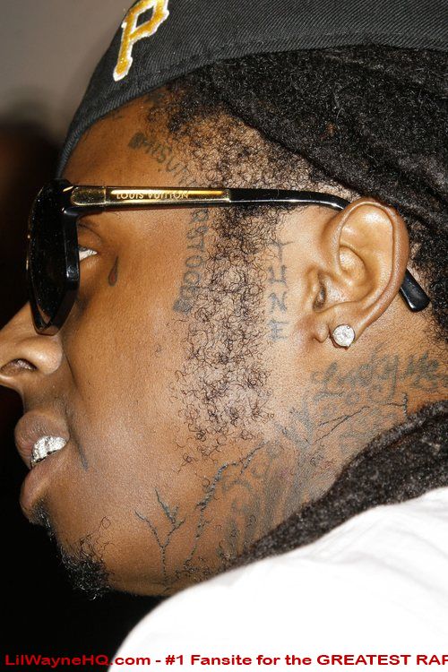 lil waynes tattoo. lil wayne tattoo meanings.