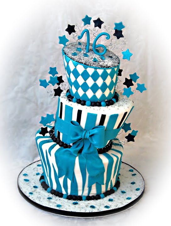 The colors are Teal Black and White Teal edible gems were made to accent 