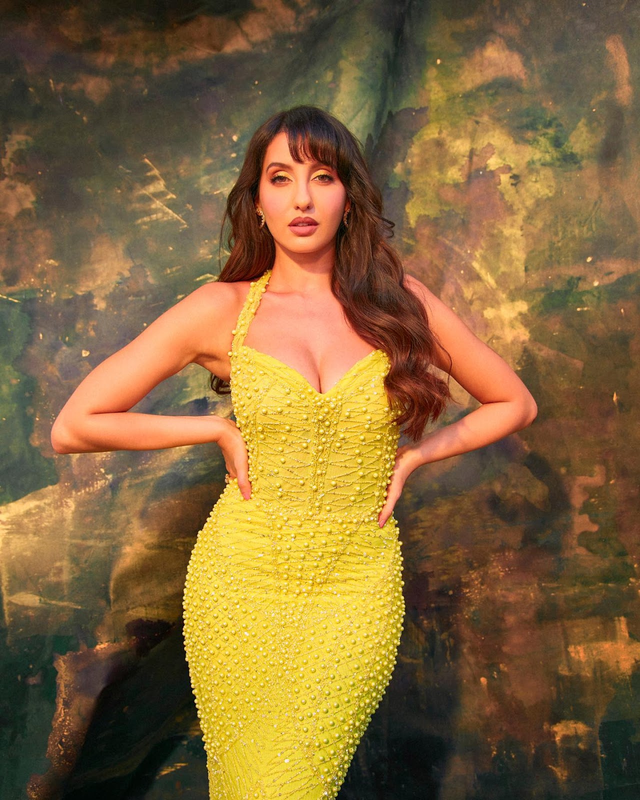 Nora Fatehi cleavage curvy yellow tight dress