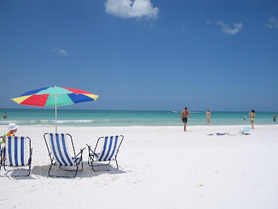 Tourist walking on the white and fine sand on the beaches of Siesta Key Clearwater picture
