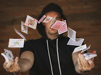 Card Trick - Photo by Edson Junior on Unsplash