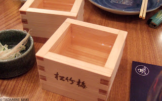 A wooden small box with Japanese cold sake