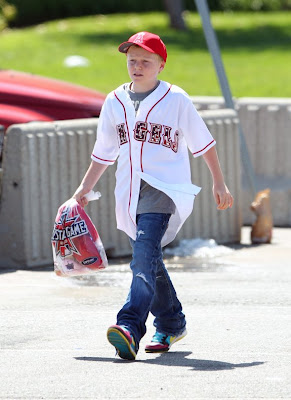 David Beckham and his family playing in the park Pictures