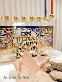 A Menorah and 2000 Year-old Pottery  --- Ms. Toody Goo Shoes