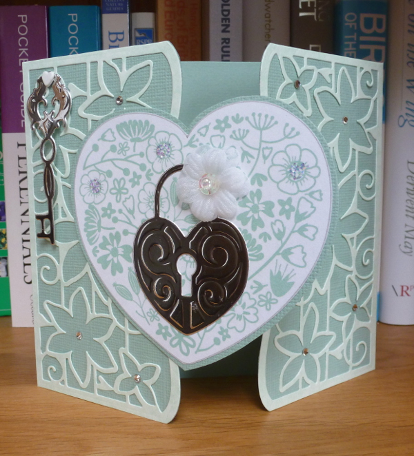 Pale green gatefold card made with Tonic dies heart topper key and lock 