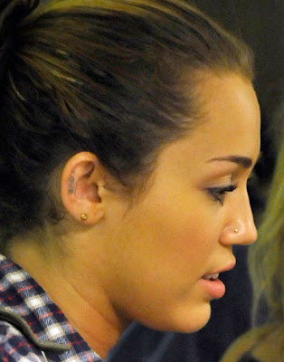 miley cyrus tattoo. miley cyrus tattoo ear. teen