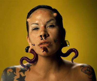 Strange Tattoos and Ugly body modifications