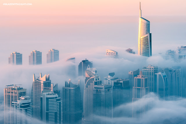 Photo of Dubai skyscrapers drowning in the morning fog