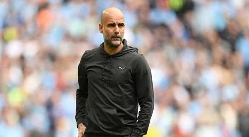Pep Guardiola feels the heat as Manchester City look to crush Arsenal's title hopes