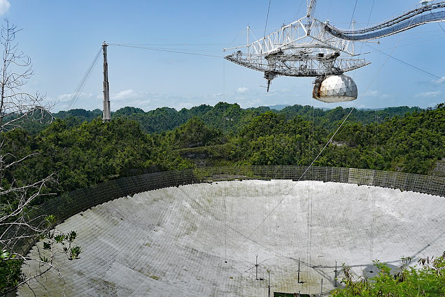 View of the Arecibo radio telescope primary dish and the spherical reflector, Arecibo Observatory, Puerto Rico.