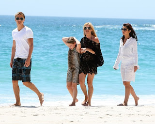 Cheryl Cole and Derek Hough taking a stroll along the beach in South Africa